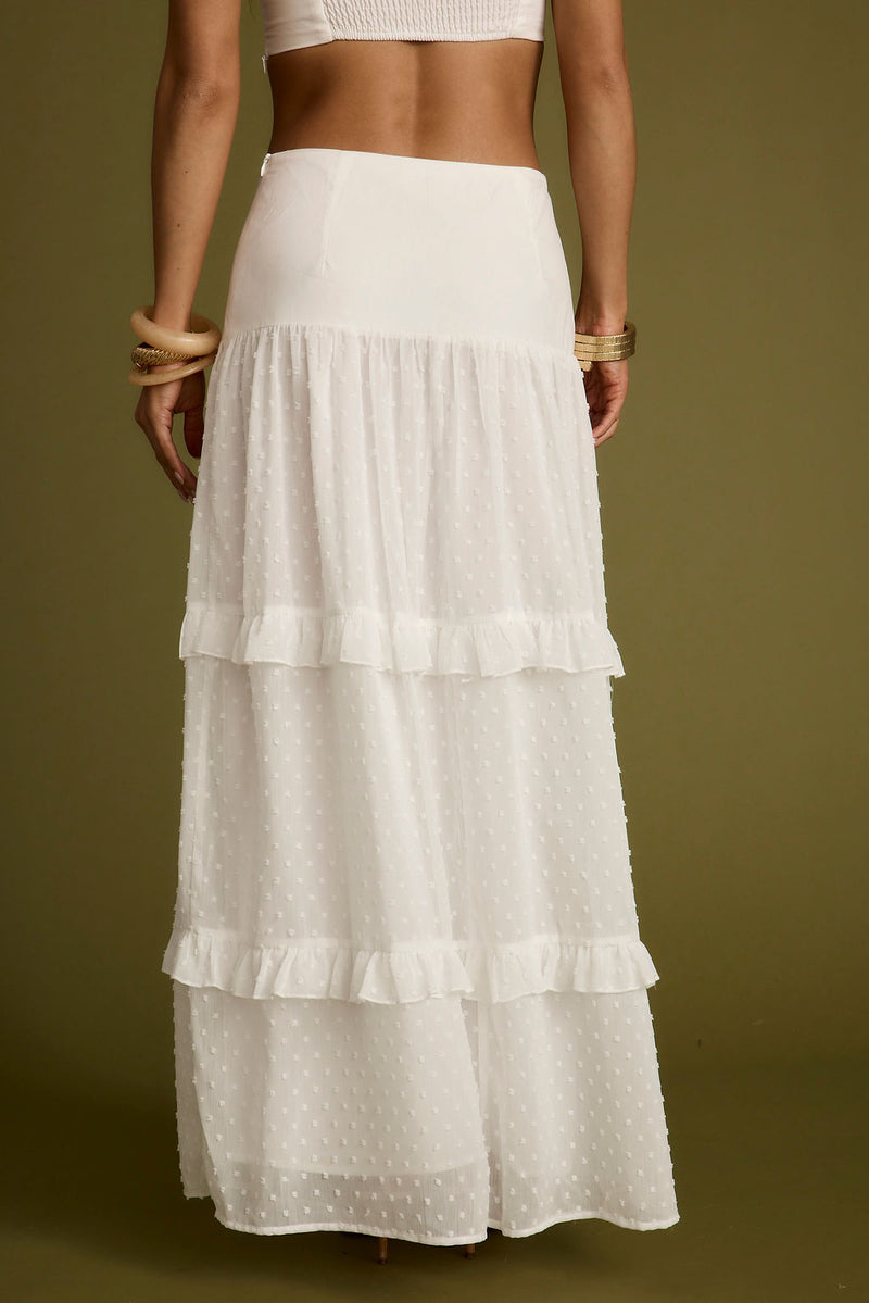 Detail shot of the Liana White Low Rise Maxi Skirt highlighting the low-rise elements.