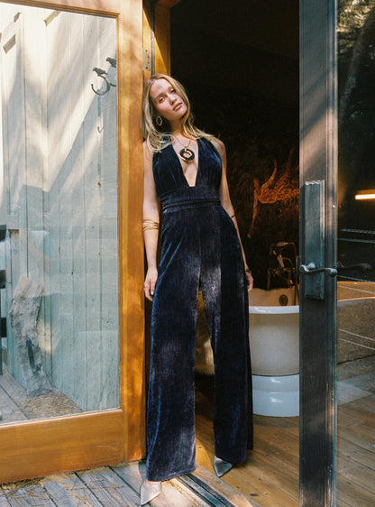 Velvet halter jumpsuit with detailing and a flattering silhouette.