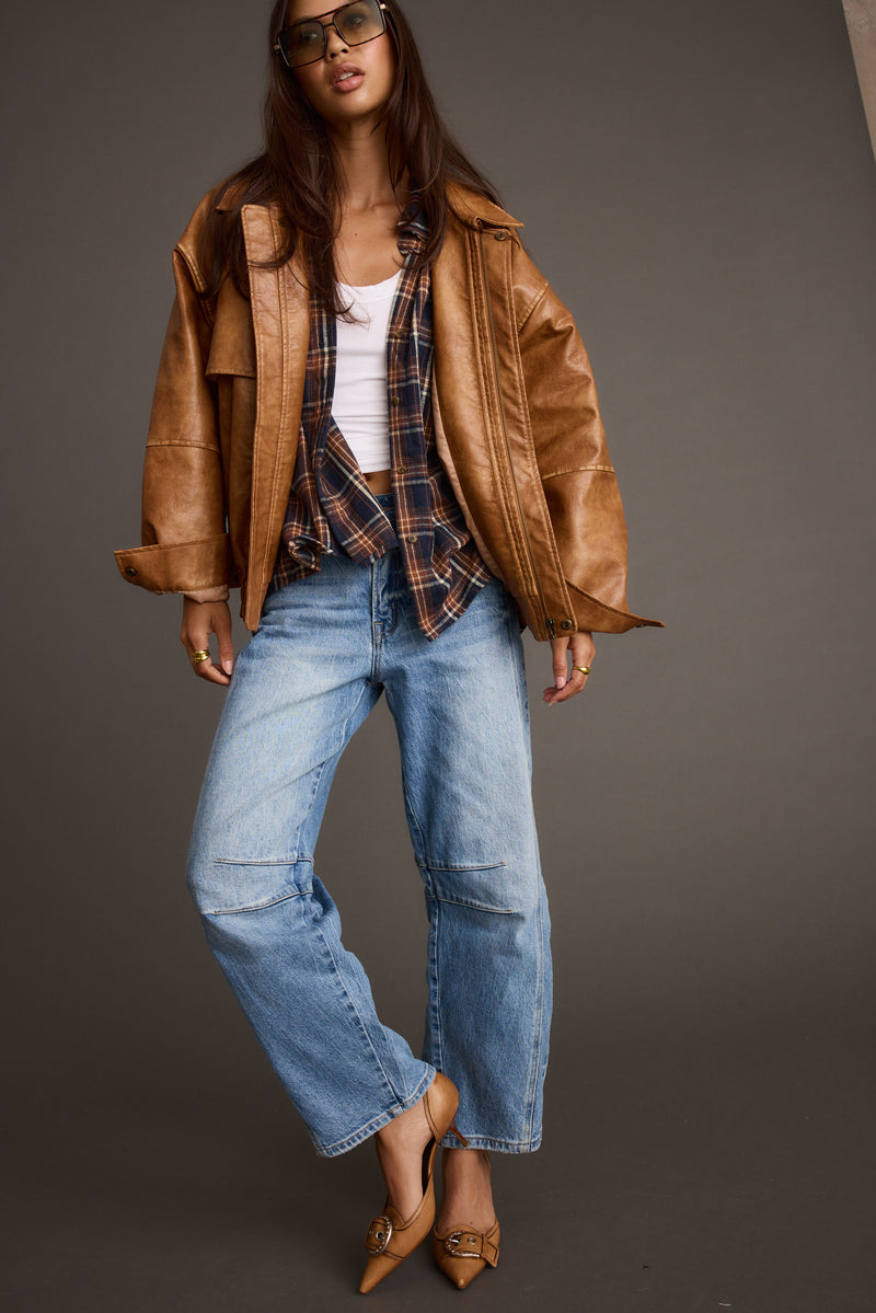 London Calling Cognac Oversized Faux Leather Jacket styled in a complete look from an alternate angle.