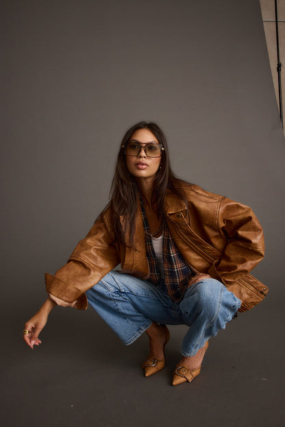 London Calling Cognac Oversized Faux Leather Jacket paired with complementary accessories for a polished look.