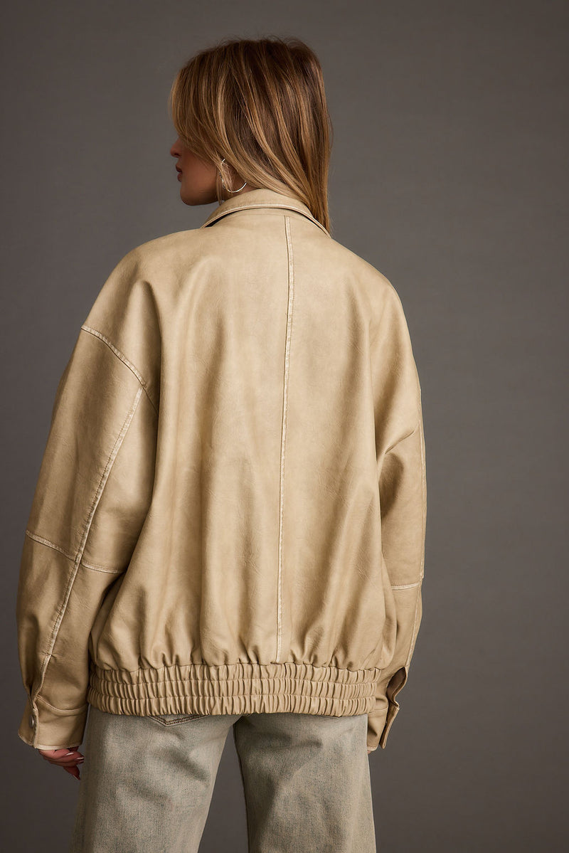 London Calling Light Taupe Oversized Faux Leather Jacket styled in a complete look from an alternate angle.