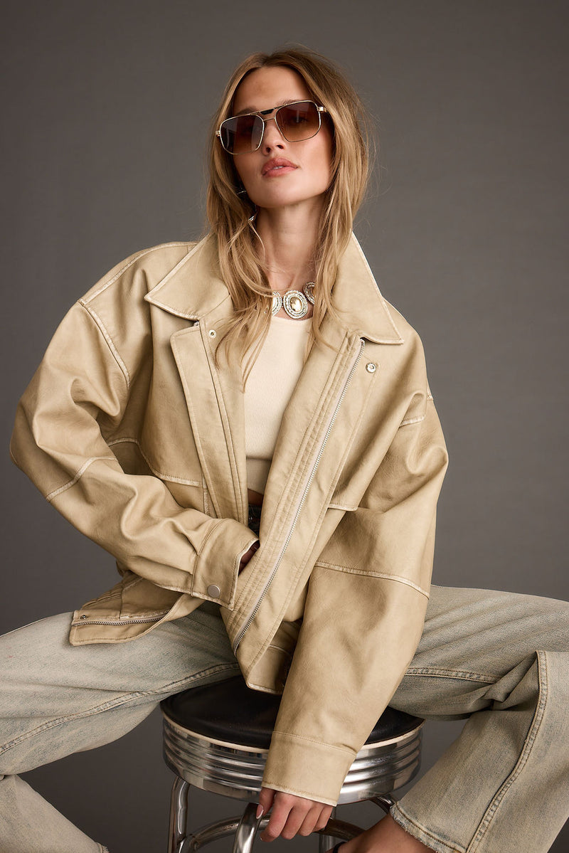 Full-length view of the jacket showing the drape and movement.