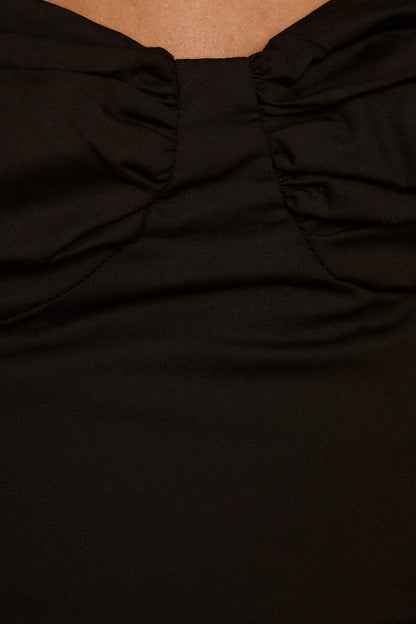 Lorelei Black Corset Top paired with complementary accessories for a polished look.