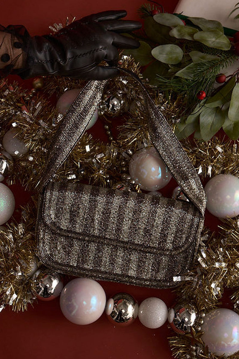 Alternate view of the black bag showing the design and craftsmanship.