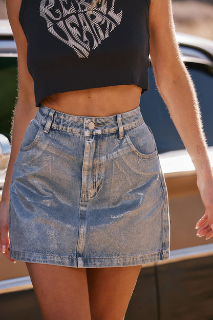 Close-up of the Macie Coated Mini Skirt showcasing the fabric texture and design details.
