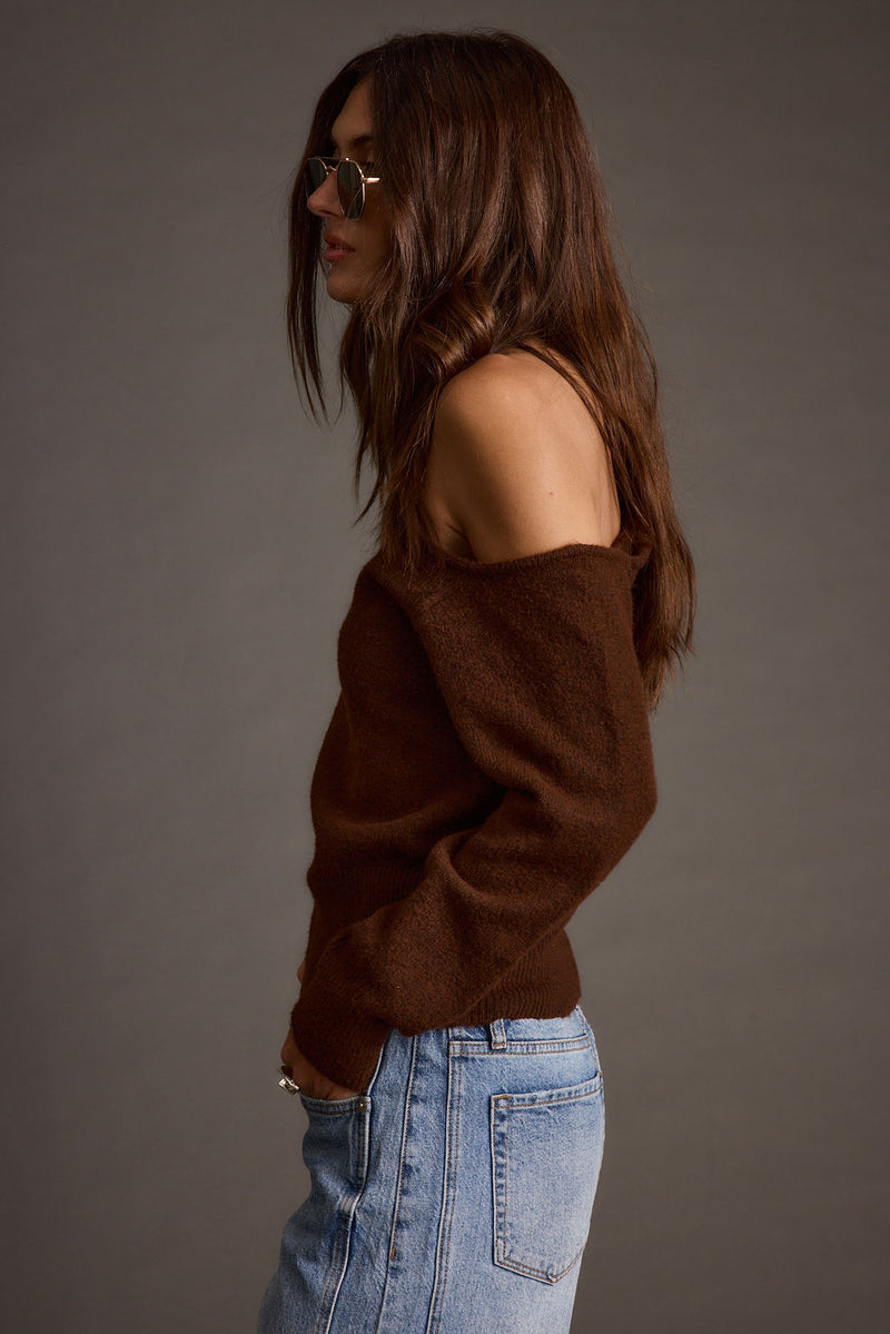 Margot Cinnamon Asymmetrical Sweater shown in a complementary styling arrangement.