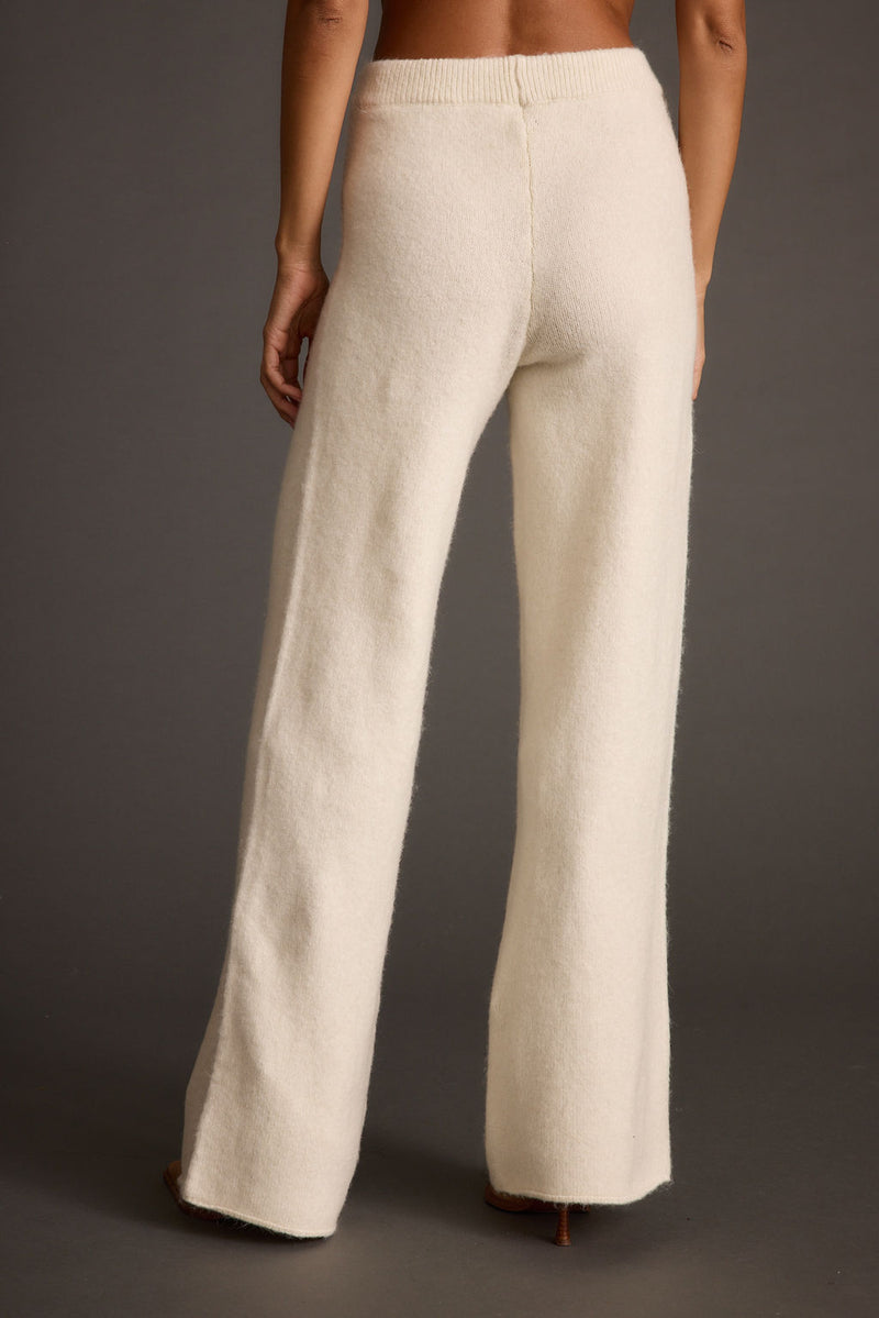 Marin Ivory Sweater Pant styled in a complete look from an alternate angle.