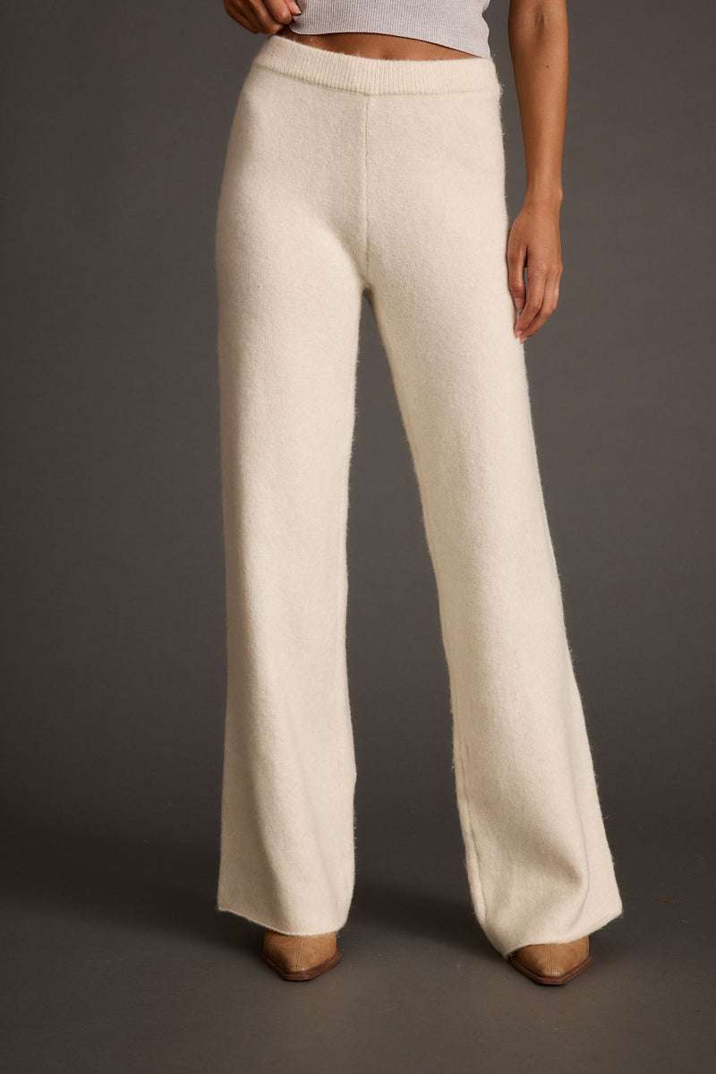 Marin Ivory Sweater Pant paired with complementary accessories for a polished look.