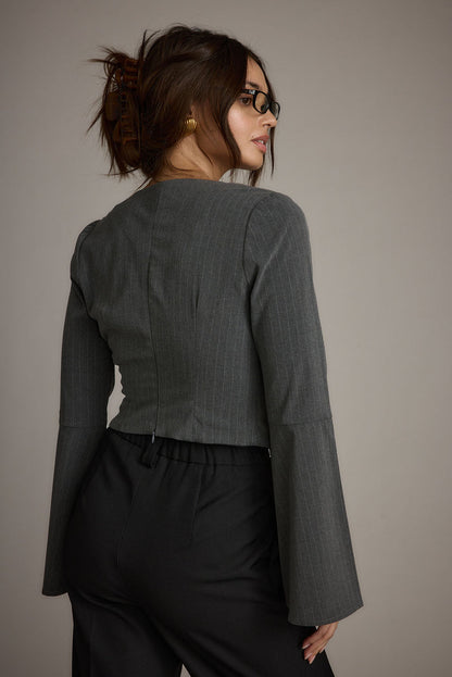 Back view of the top showing the silhouette and fit.