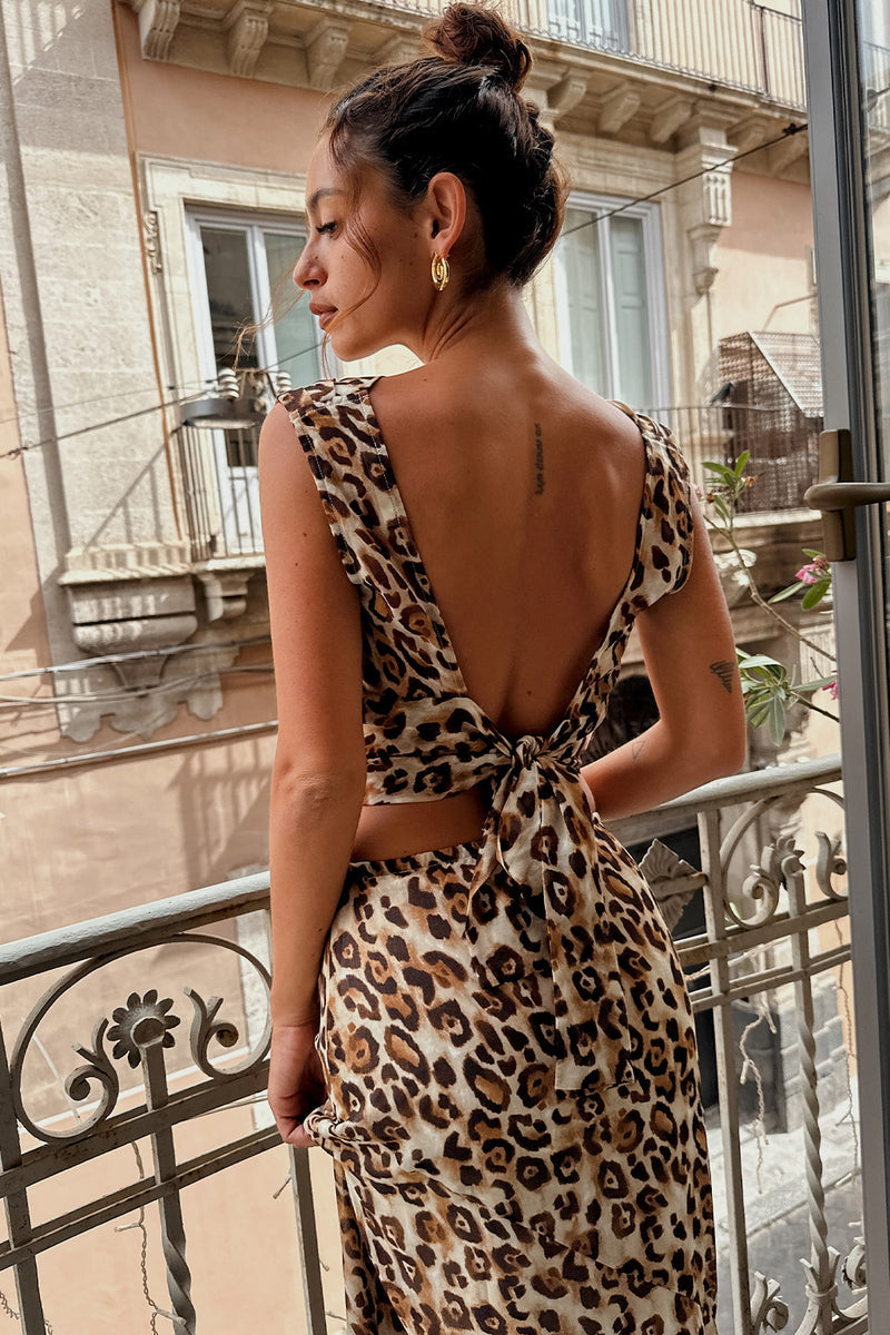 Mila Leopard Maxi Skirt paired with complementary accessories for a polished look.