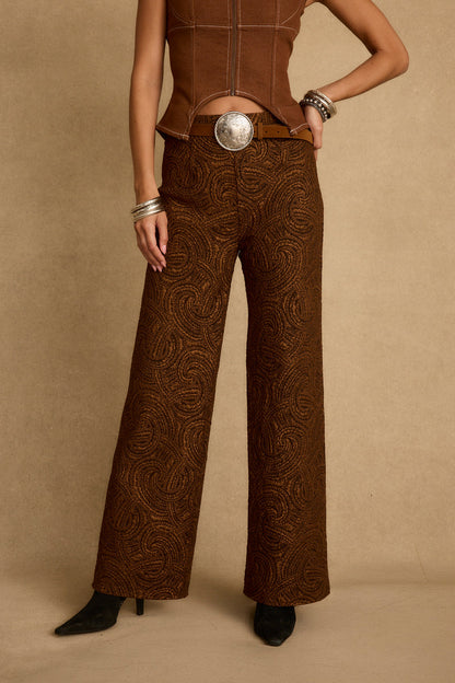 Cognac wide-leg trousers with refined detailing and a flattering silhouette.