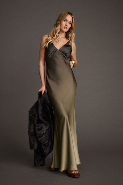 Alternate angle of the olive maxi dress highlighting the overall design.