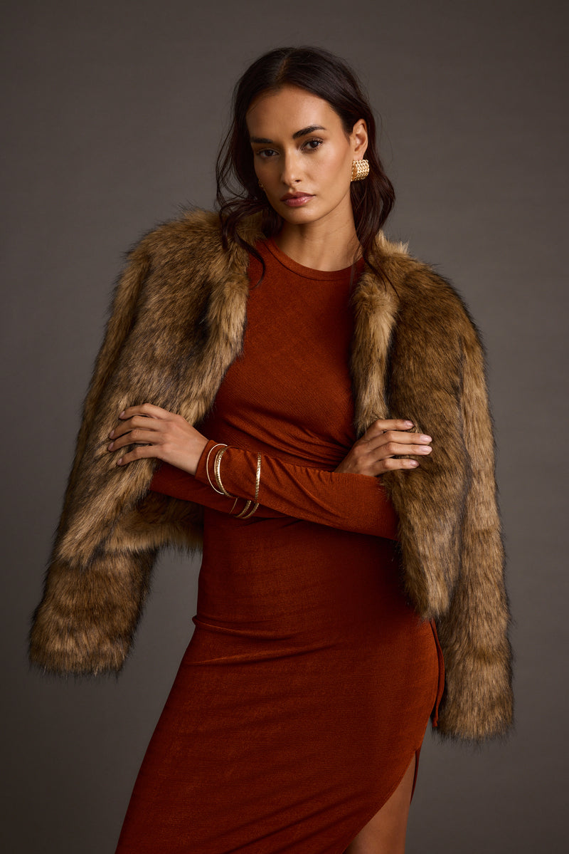 Brown faux fur jacket with refined accents, a brown fur essential.