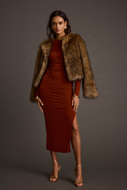 Back view of the brown faux fur jacket showing the silhouette and fit.