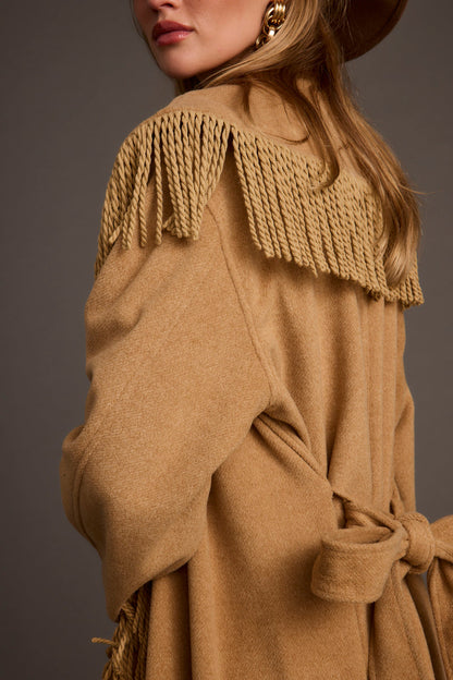 Alternate angle of the camel jacket highlighting the overall design.