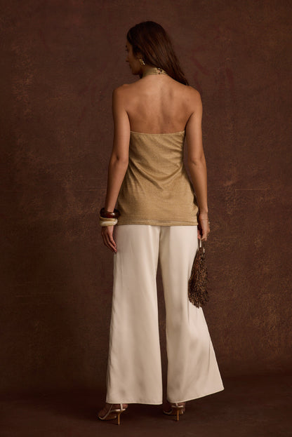 Moonlit Kiss Gold Lurex Halter Top paired with complementary accessories for a polished look.