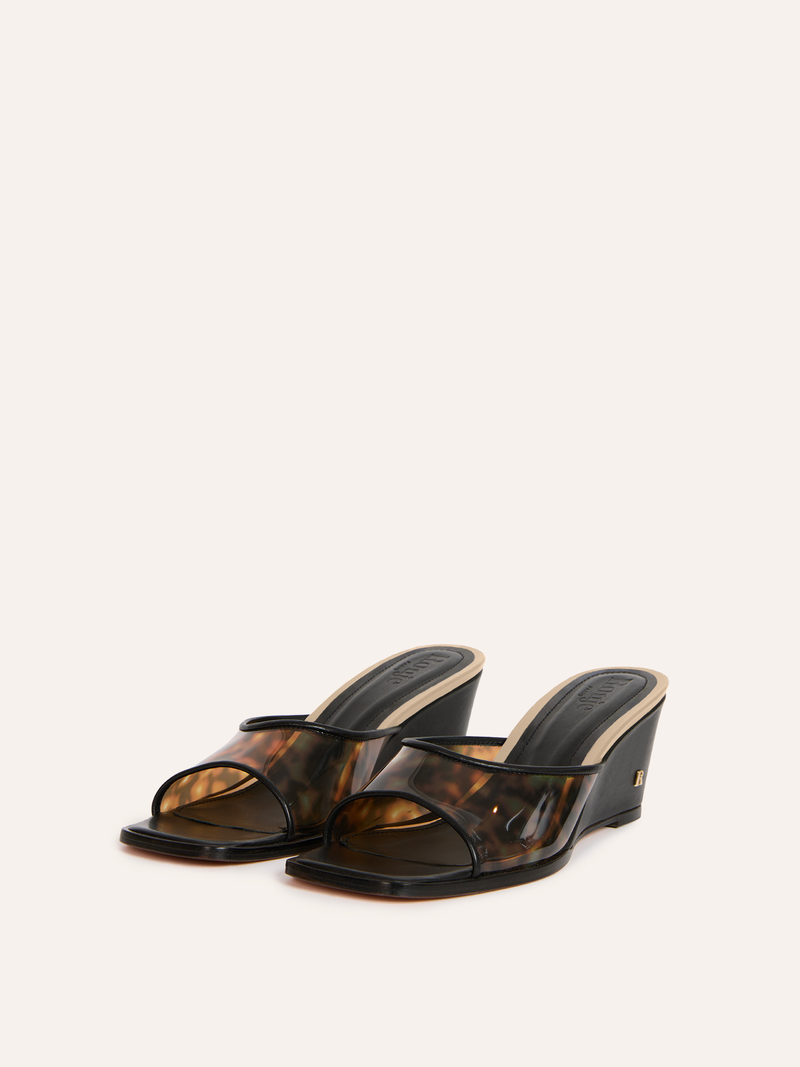Natty black tortoiseshell mules, 3/4 front view packshot