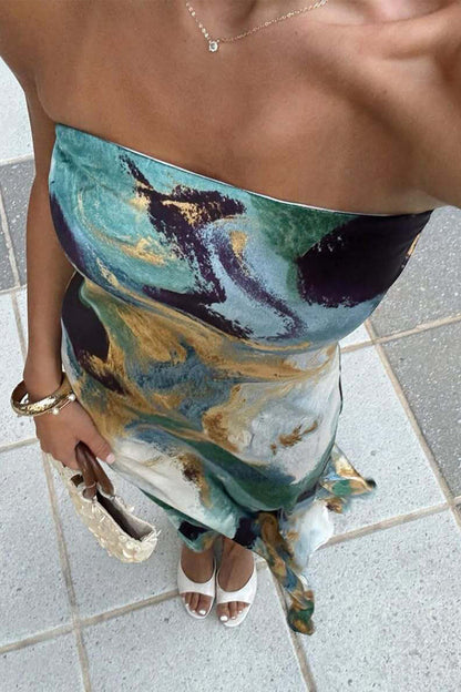 Blue strapless maxi dress with elegant accents, a gold fringe dress essential.