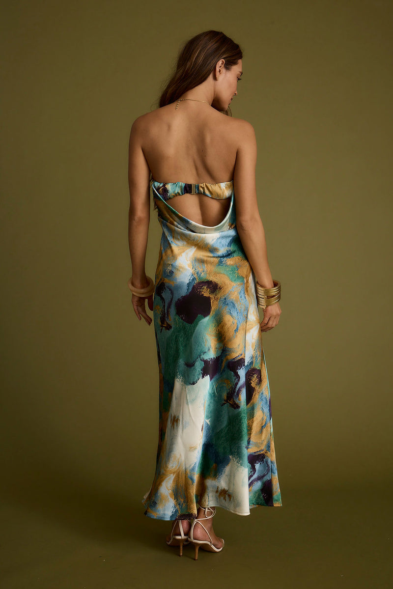 Back view of the blue maxi dress showing the silhouette and fit.