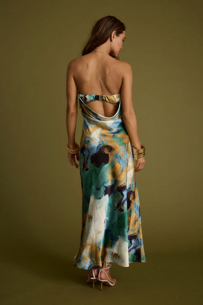 Back view of the blue maxi dress showing the silhouette and fit.
