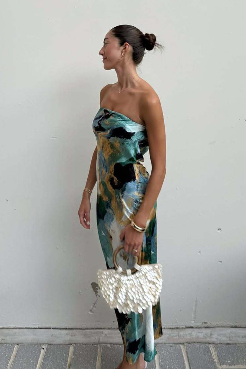 Close-up of the Natalia Blue and Gold Watercolor Strapless Maxi Dress showcasing the fabric texture and design details.