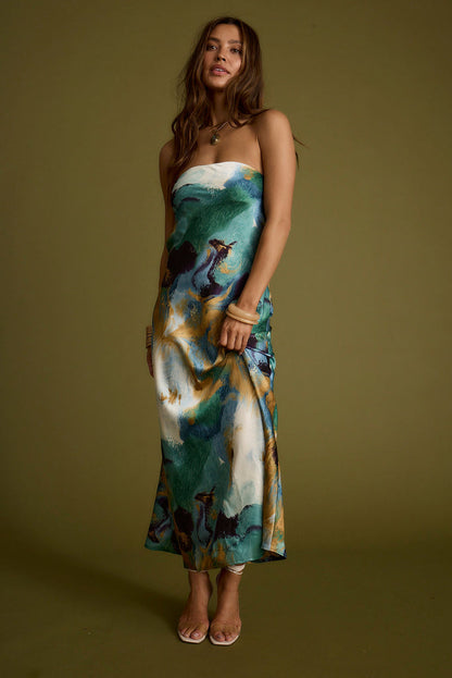Lifestyle shot of the blue maxi dress styled for day-to-night versatility.