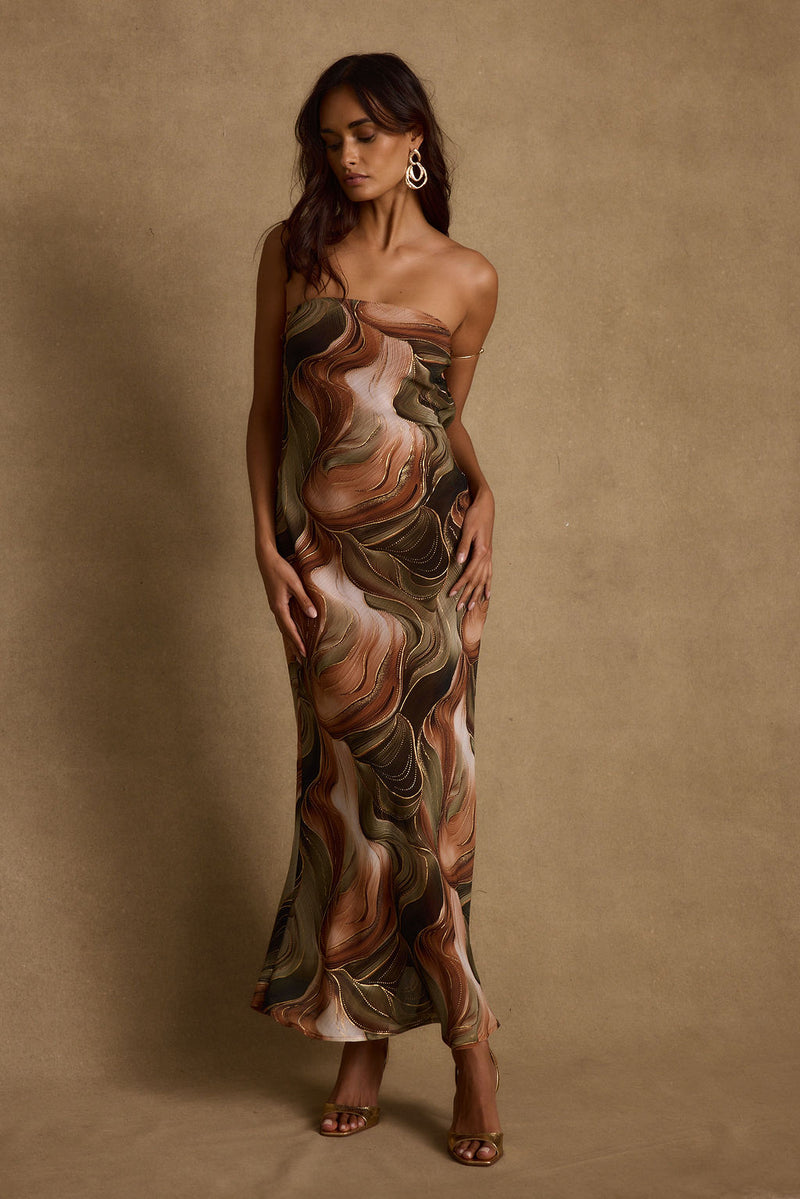 Back view of the olive maxi dress showing the silhouette and fit.