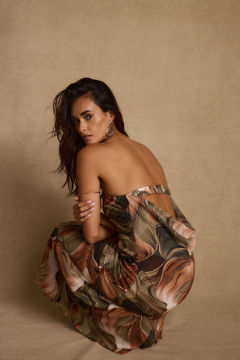 Natalia Olive and Rust Abstract Strapless Maxi Dress styled in a complete look from an alternate angle.