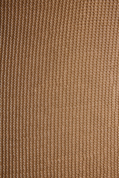 Detail shot of the Nerina Gold Lurex Mini Dress highlighting the design elements.