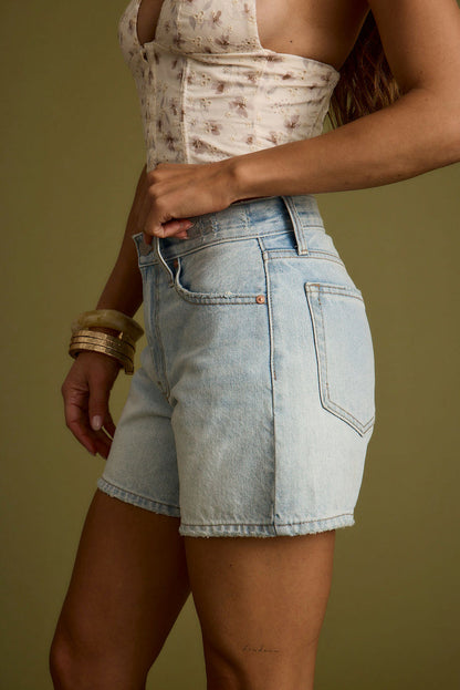 Close-up of the Nico Light Wash Denim Shorts showcasing the denim texture and craftsmanship.