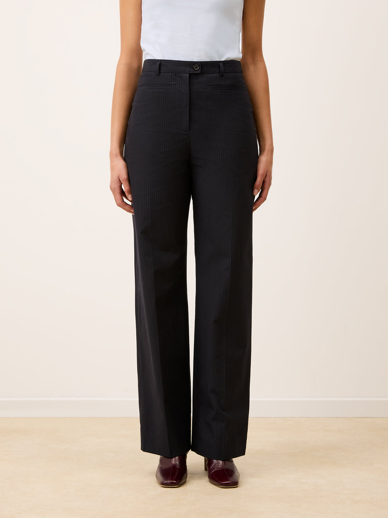 PATRICIO black striped pants worn on a model by Rouje