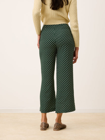 SUZON green polka-dot pants, detail of ankle buttons by Rouje