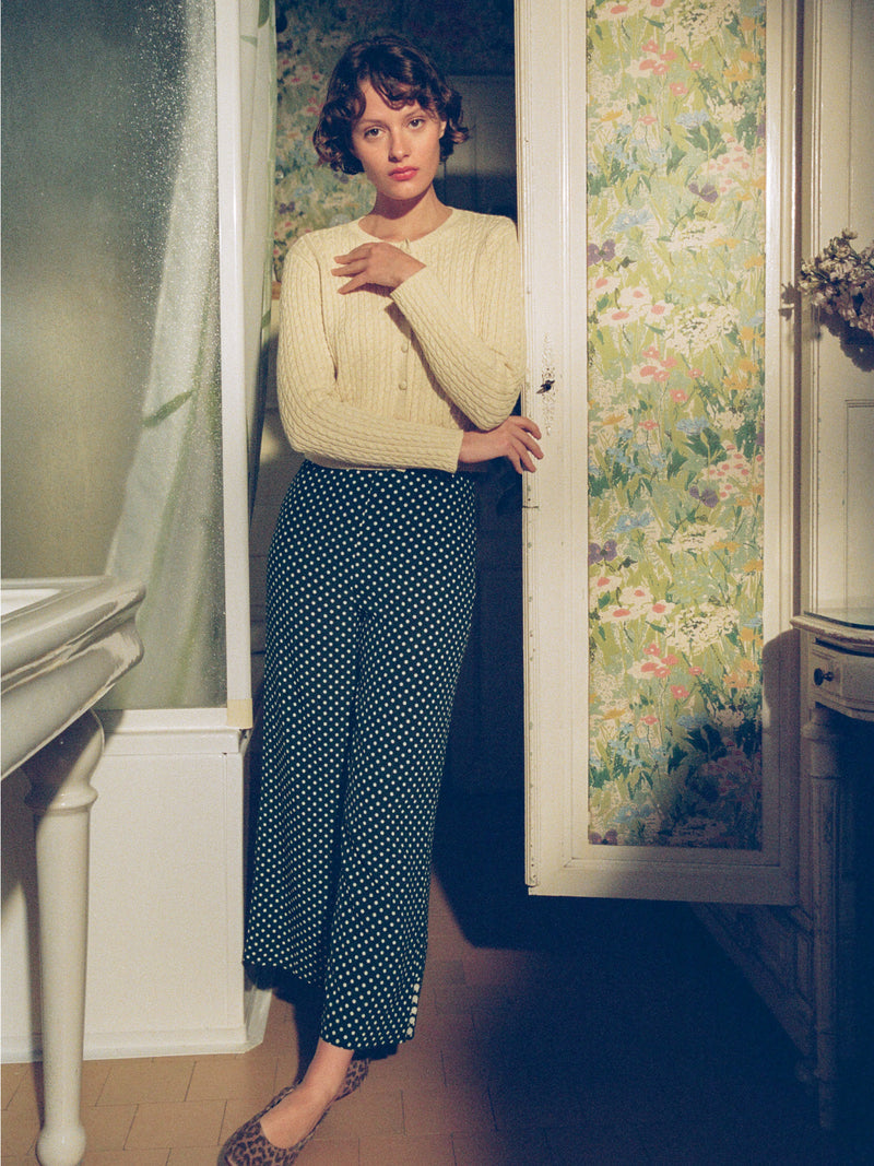 SUZON green polka-dot 7/8-length high-waisted pants, flat packshot by Rouje