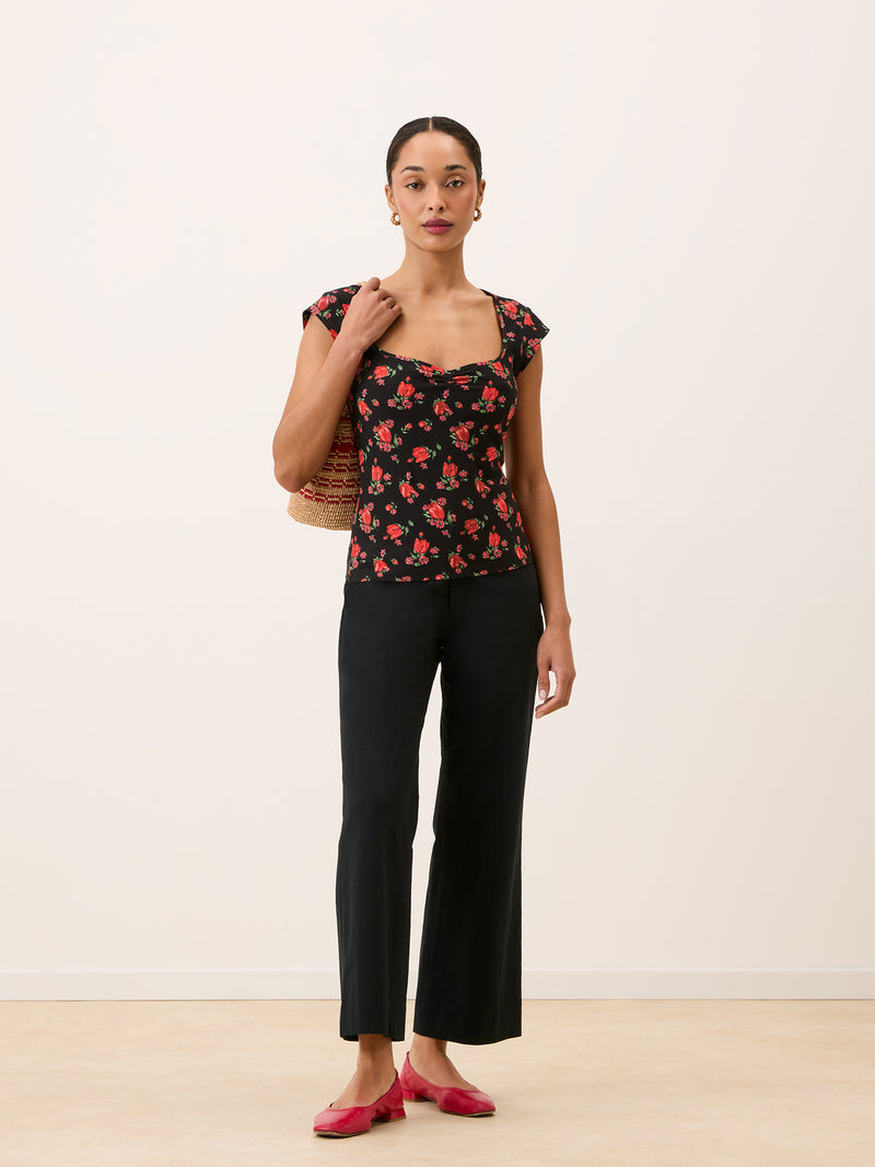 YUNA black floral print top worn on a model by Rouje