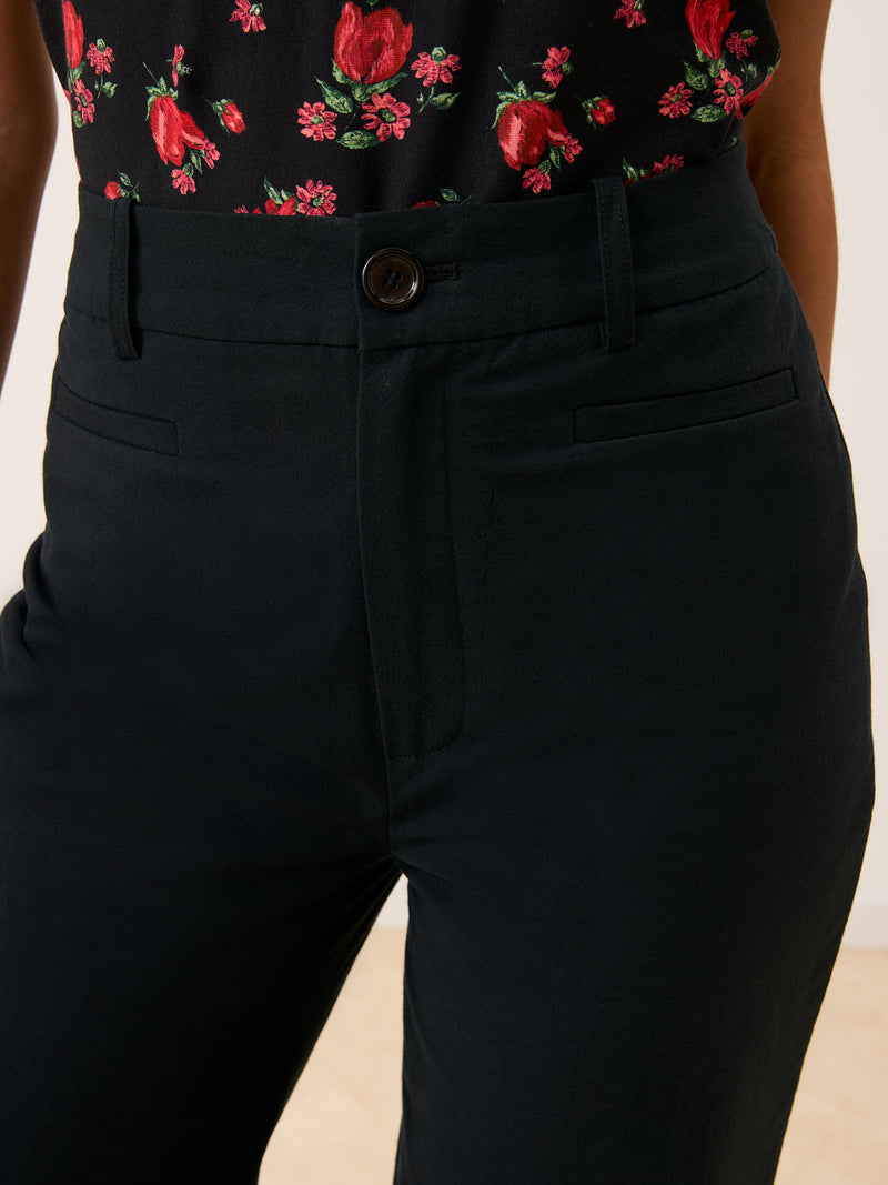SWAN black flare pants, detail of welt pockets by Rouje