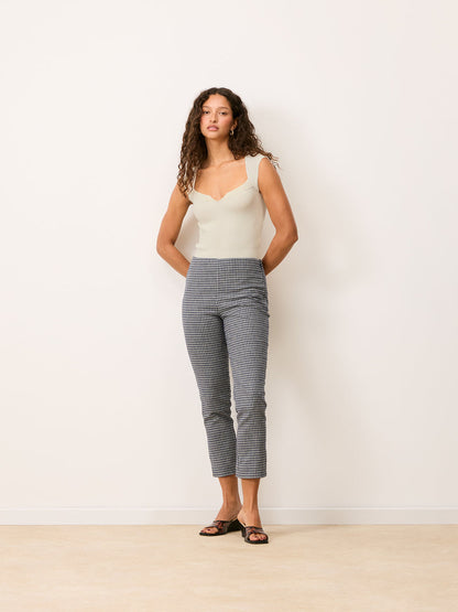 ZOLA navy blue check pants worn on a model by Rouje