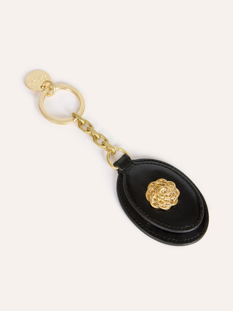 CHARME aged black leather pocket mirror key ring, front view by Rouje