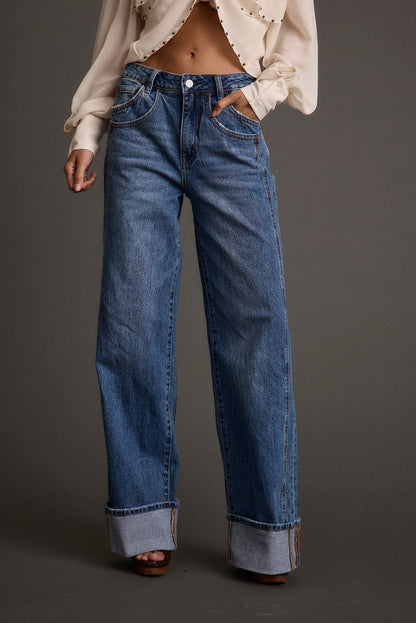 Denim pants with refined accents, a cuffed straight leg jeans standout.