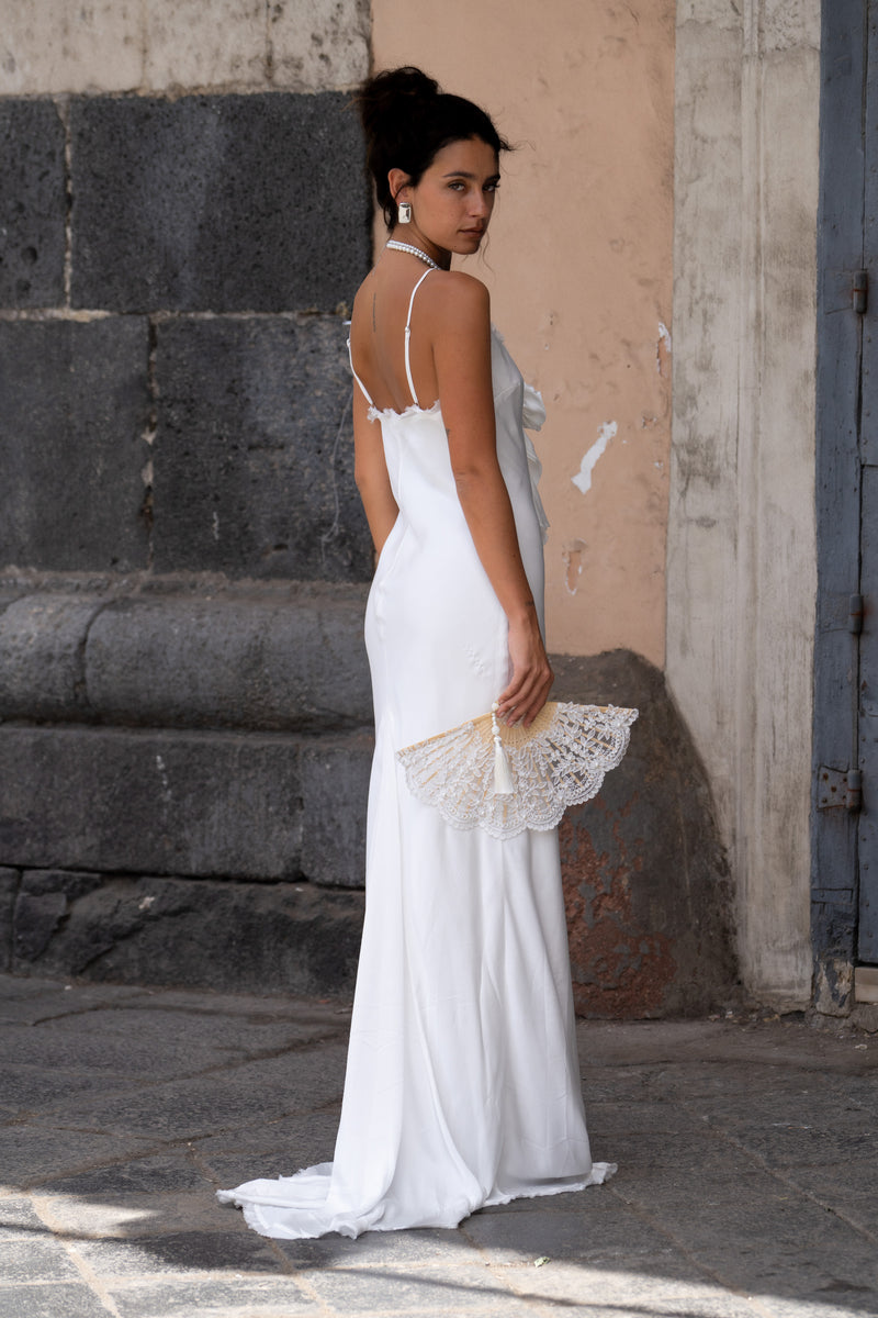 Prosecco White Rosette Frill Maxi Dress styled in a complete look from an alternate angle.