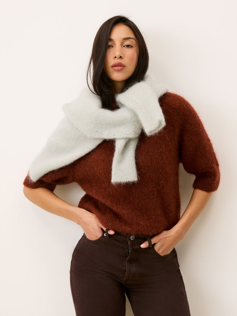 Olivia mohair sweater in carmin red front view, worn with another sweater