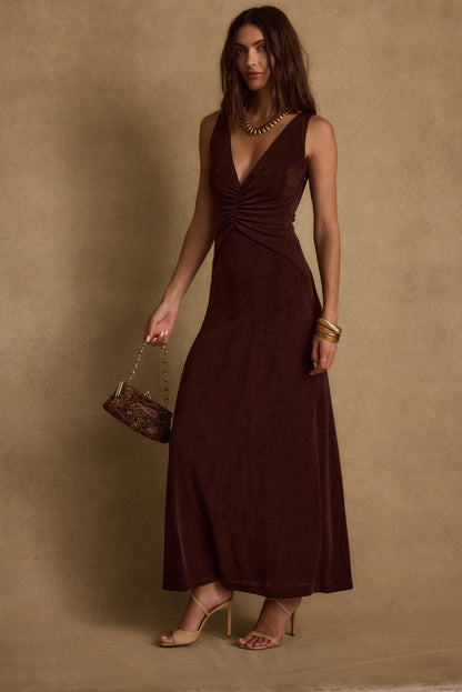 Espresso maxi dress with elegant accents, a vacation maxi dress essential.