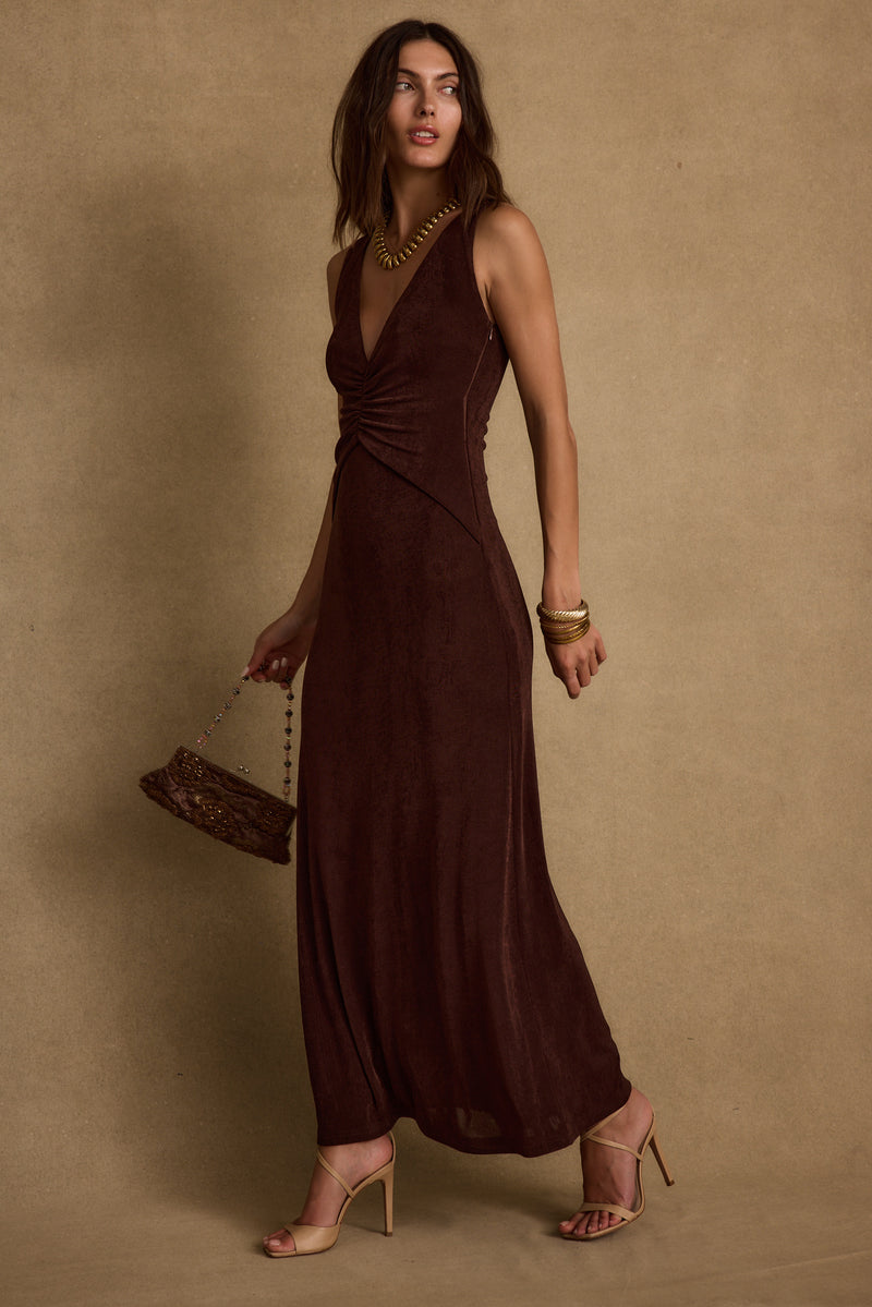 Back view of the espresso maxi dress showing the silhouette and fit.