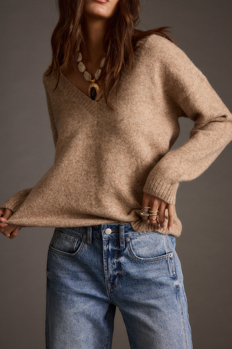 Close-up of the Robbyn Light Taupe Sweater showcasing the fabric texture and design details.