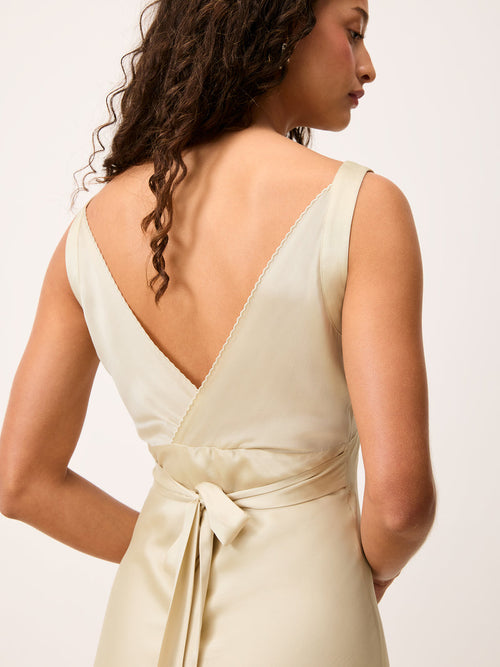 ALICE cream satin sleeveless midi dress, back view with tie belt by Rouje
