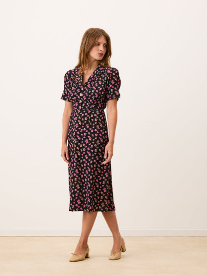 ANAIS black floral midi dress worn on a model by Rouje