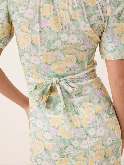 ANAIS pastel green floral midi wrap dress, lifestyle setting by Rouje