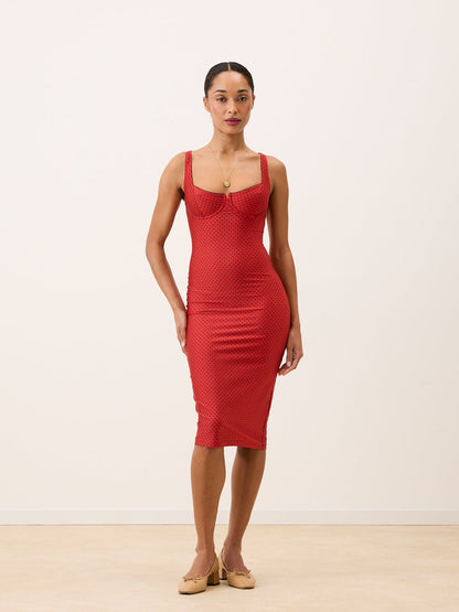 ARIELLE red plumetis midi dress worn on a model by Rouje