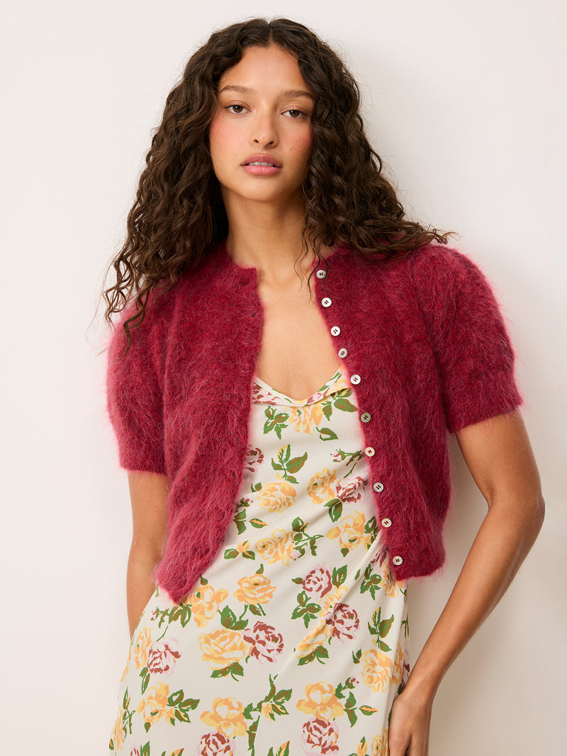 Asma sleeveless floral crepe midi dress worn by a model with a cardigan, front view