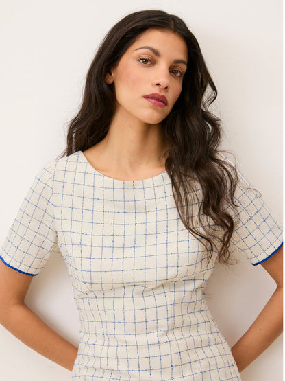 ELENORE ecru check pattern short dress worn on a model by Rouje