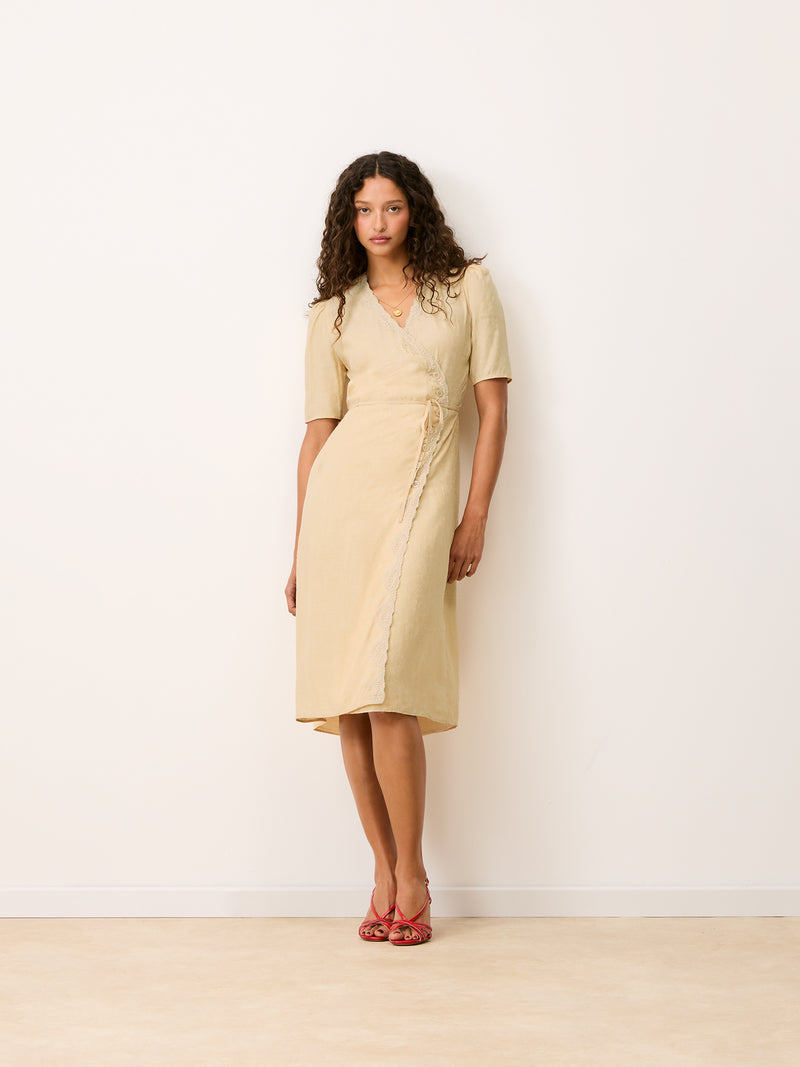GABIN cream lace midi dress worn on a model by Rouje